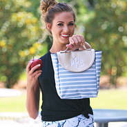 Modeling holding apple and Gray Stripe Lunch Box