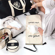 Girl packing her Monogrammed Lingerie Bag
