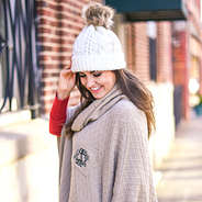 Thick knit hat with faux fur pom