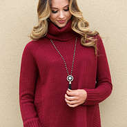 Modeling Holding Tassel Pendant Necklace