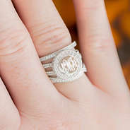 pave ring stack with monogram on hand