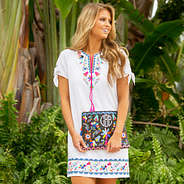 Model wearing Mexicali Dress holding Mexicali Clutch