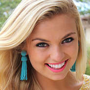 model wearing Turquoise beaded Tassel Earrings