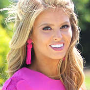 model wearing Pink beaded Tassel Earrings