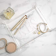 monogrammed acrylic tray on marble counter