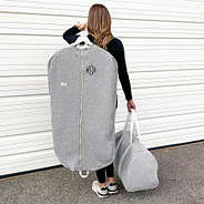 monogrammed quilted garment bag with matching weekend bag