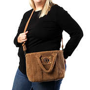 meredith wearing sherpa crossbody bag