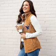 girl wearing sherpa vest with West Virginia logo