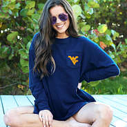 girl outside wearing navy coastal crewneck with West Virginia Mountaineers logo