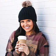 black chunky knit beanie with coffee
