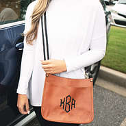 crossbody in black and white with brown purse