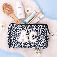 patch Large Letter in White on neoprene cosmetic case in ivory leopard