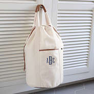 Ivory Packable Laundry Bag hanging around navy thread