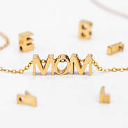 diy letter charm necklace with mom spelled out
