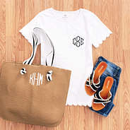 white scalloped top with beach bag outfit
