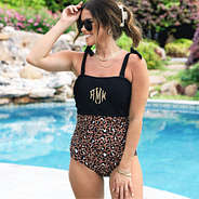 leopard monogrammed one piece bathing suit at pool
