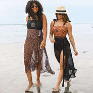 cheetah and black long luxurious sarongs on the beach