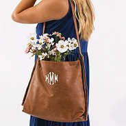 convertible backpack on shoulder with flowers