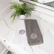 white hand towel with grey hand towel