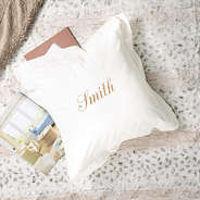 monogrammed white ivory pillow sham with name on blanket