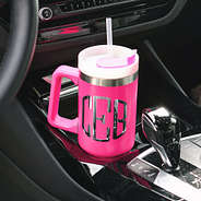monogrammed hot pink travel tumbler in car