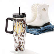 cowhide monogrammed travel tumbler with cowboy boots