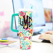 wild blooms travel tumbler on desk