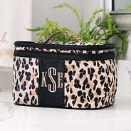 cheetah monogrammed train case in bathroom