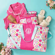 monogrammed weekend bag and train case in painted petals