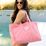 monogrammed terry tote on shoulder