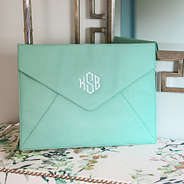 mint envelope laptop case in foyer room