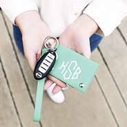 close up of girl holding mint card holder