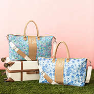 pastel flora trellis and blue botanical charleston weekender with vintage suitcase
