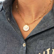 Monogrammed Layered Shell Necklace in gold on neck