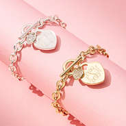 duo monogrammed heart bracelet in gold and silver