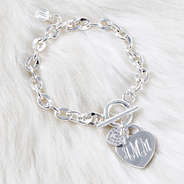 Monogrammed Heart Bracelet on fur