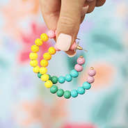 nails holding the multi hoop earrings