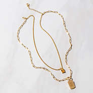 full view of monogrammed tag necklace