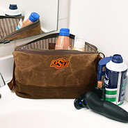 Oklahoma State Cowboys Waxed Canvas Dopp Kit on counter