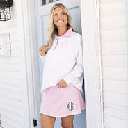 Ashley wearing skort in pink seersucker