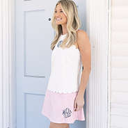 ashley wearing scalloped tank and skort in pink seersucker