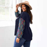 side view of monogrammed puff sleeve top in navy safari