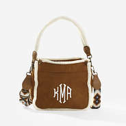 monogrammed suede crossbody