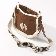 monogrammed suede sherpa crossbody bag