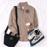 taupe quarter zip sweatshirt with crossbody and sneakers