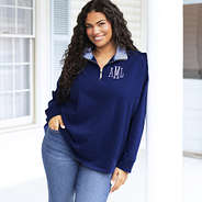 girl wearing blue shells quarter zip sweatshirt