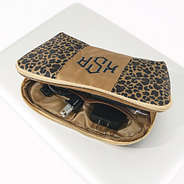 leopard monogrammed tech pouch with with cords inside