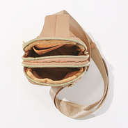 inside of tan sling bag