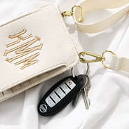 bone monogrammed phone crossbody with keys attached