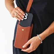 brown phone crossbody bag with phone